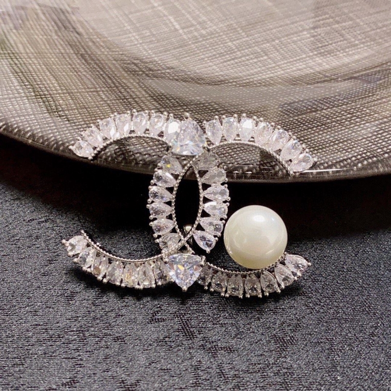 Ch**el brooches